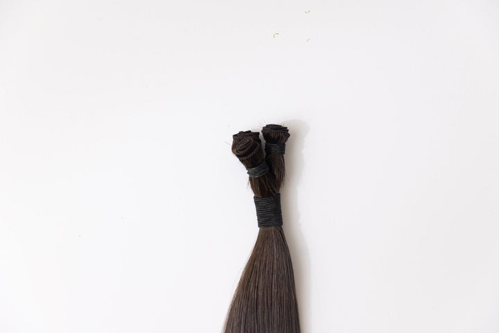 Going to the Dark Side: Hand-Tied Wefts